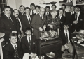 Picture:Brian Green - 1991 - RNLI Mrs Keene's Christmas Party - Jurat Guy Blampied carves the turkey with Mrs Georgina Keene