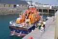 Pic by Tony Rive 25-04-11An injured man is carried off the St Peter Port Lifeboat by Lifeboat Crew and Ambulance and Rescue personnel.