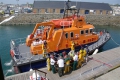 Pic by Tony Rive 25-04-11An injured man is carried off the St Peter Port Lifeboat by Lifeboat Crew and Ambulance and Rescue personnel.