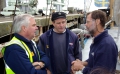 Alva's Captain (R) thanks Guernsey's Harbour master (L) and Lifeboat Coxwain for their rescue Pic by Tony Rive 06-10-08