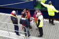 Anita Bomba's French crew being met by the Harbour Master Peter Gill 07-02-10 Pic by Tony Rive (2)