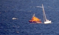 Daniel L Gibson arrives alongside the local yacht Majic off St Martin's Point 16-08-14 Pic by Tony Rive (3).jpg