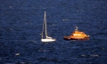 Daniel L Gibson arrives alongside the local yacht Majic off St Martin's Point 16-08-14 Pic by Tony Rive (4).jpg