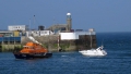 Daniel L Gibson towing the motor boat Wave Dancer into St Peter Port Shout (1) 15-09-14 Pic by Tony Rive (2).jpg