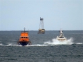 Pic by Tony Rive 17-09-15Guernsey's Lifeboat Spirit of Guernsey towing the local Fishing boat Defiance south down the Little Russel south of Roustel Beacon heading for St Peter Port harbour. The 40ft Aqua-Star Trawler built in Ireland got a Rope wrapped around its Propellor as it steamed north towards the Casquete's Fishing Grounds