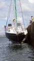 French yacht Douze (13) being craned out of St Peter Port harbour 22-08-14 Pic by Tony Rive (1).jpg