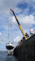 French yacht Douze (15) being craned out of St Peter Port harbour 22-08-14 Pic by Tony Rive (1).jpg