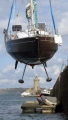 French yacht Douze (16) being craned out of St Peter Port harbour 22-08-14 Pic by Tony Rive (1).jpg