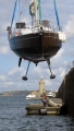 French yacht Douze (17) being craned out of St Peter Port harbour 22-08-14 Pic by Tony Rive (1).jpg