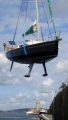 French yacht Douze (19) being craned out of St Peter Port harbour 22-08-14 Pic by Tony Rive (1).jpg