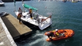 Jason Norman pull'saway from the French yacht Douze (12) in the Lifeboat's Y boat 22-08-14 Pic by Tony Rive.jpg