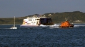 Lifeboat Daniel L Gibson towing the British yacht Jeanie 3 twards St Peter Port Harbour 29-06-14 Pic by Tony Rive (3).jpg