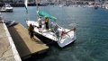 Lifeboat man Rob Alder talking to the owner of the French yacht Douze (12) 22-08-14 Pic by Tony Rive.jpg