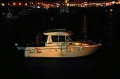 Marina staff taking the French Merry Fisher to the Victoria Marina 28-08-14 Pic by Tony Rive.jpg