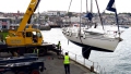 The French yacht Waton being lifed out of St Peter Port harbour 15-05-15 Pic by Tony Rive.jpg