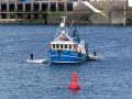 Pic by Tony Rive 17-09-15 Two Guernsey Harbour's Marina Dories alongside the 40ft local Fishing boat Defiance after the Lifeboat Spirit of Guernsey had towed it into Port. The Fishing boat got a Rope wrapped around it's Propellor as it steamed to Fishing grounds north of Guernsey. The two dories towed the Fishing boat to its berth on the East side of the Fish Quay.