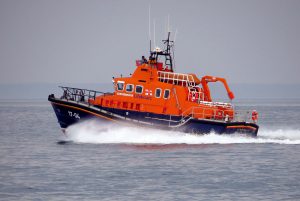 Pic by Tony Rive 06-05-16 Lifeboat Spirit of Guernsey speeds out of St Peter Port this eving to pick up to French Young People who got into difficulties in their Dinghy off Brecqhou. They were collected from Brecqhou Harbour and returned to St Peter Port.