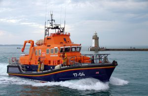 Pic by Tony Rive 06-05-16 Lifeboat Coxswain Jason Norman gives the Thumbs-Up as he brings Lifeboat Spirit of Guernsey back into St Peter Port after a siuccessful rescue of two young French people from Brecqhou Island.