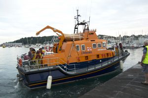 Pic by Tony Rive 21-07-16 The Lifeboat Spirit of Guernsey about to moor alongside number 1 Ro-Ro Ramp in St Peter Port after picking up two Male Jet Skier's and their Jetski from Portinfer after their Battery had failed.