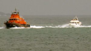 Lifeboat Spirit of Guernsey towing Fair Douze to St Peter Port 10-07-16 Pic by Tony Rive