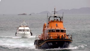 Lifeboat Spirit of Guernsey towing Fair Douze to St Peter Port Pic by Tony Rive