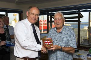 Pic by Tony Rive 20-07-16 Guernsey's Bailiff Sir Richard Collas presenting Guernsey' Top Lifeboat (Top Box) Fundraiser Alf Solway a Plaque from the RNLI and Guernsey's Lifeboat Station after year of him raising funds for our local Station totalling £31,500. Alf raises Donation's aiding people with various Aches and Pains but never charges for his services, only asking for donation's to Guernsey Lifeboat Station.