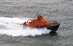 Pic by Tony Rive 21-08-16 Local Lifeboat Spirit of Guernsey passing Herm Island's south coast cliff's whilst on Passage from Sark to St Peter Port following the Sea Church service in Sark's Creux Harbour also attended by the Marine Ambulance launch Flying Christine III