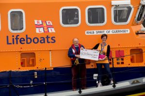 a-cheque-of-1000-being-presented-to-edward-fattorini-by-great-north-run-competito-julie-eastwood-aboard-spirit-of-guernsey-28-10-16-pic-by-tony-rive-2